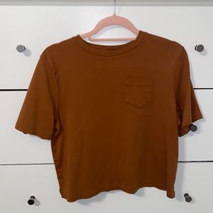 Rust colored short sleeve shirt, size S
